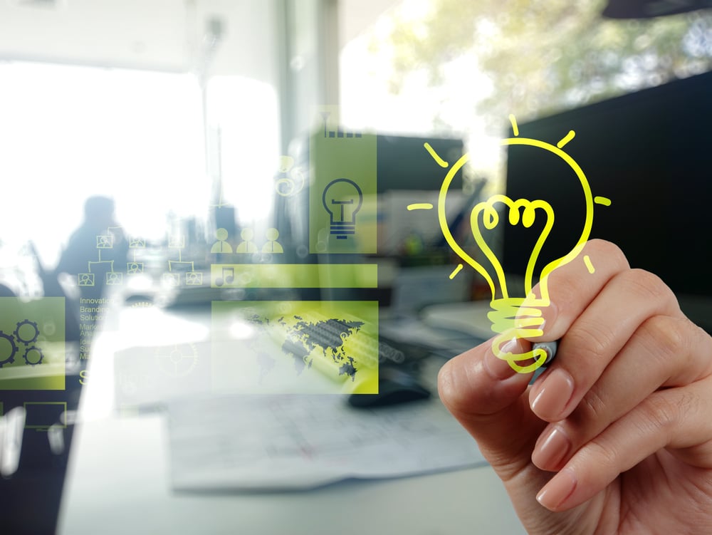 hand drawing creative business strategy with light bulb as concept hand drawing creative business strategy with light bulb as concept